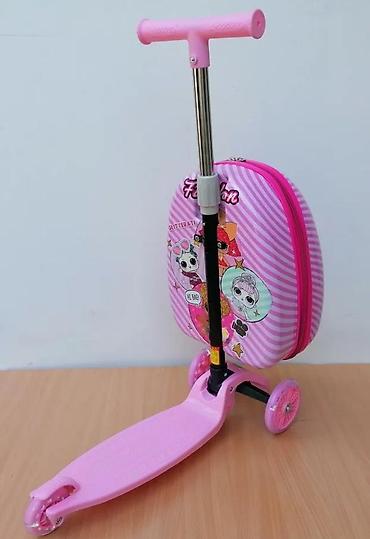 Trotineti, skejtbordovi i hoverbordovi: Dečiji trotinet sa integrisanim koferom u roze boji, idealan za — 9