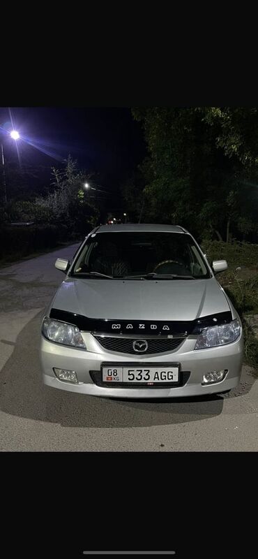 Mazda: Mazda 323: 2003 г., 1.5 л, Механика, Бензин, Хэтчбэк