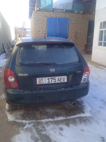 купить двигатель опель вектра а 1.6: Mazda 323: 2002 г., 1.2 л, Механика, Бензин