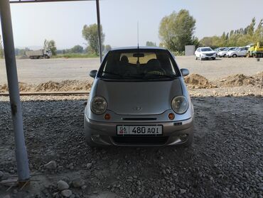 мотоциклы цена: Хэтчбек Daewoo Matiz серого цвета с четырьмя дверями и компактным
