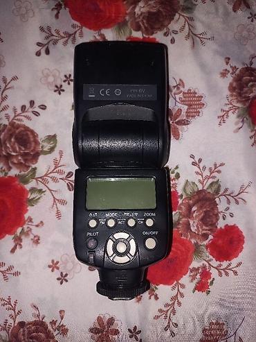 Fotoaparat üçün xarici işıq (speedlite) flaş. Xüsusiyyətlər: - Üstdən