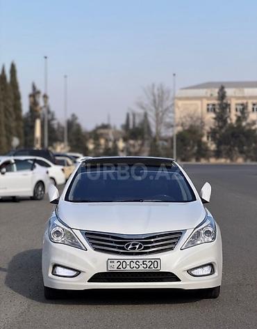 megane disk: Hyundai Grandeur (Azera) – ağ rəng, sedan, geniş və komfortlu salon — 1