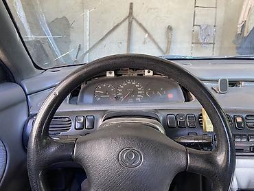 Mazda Cronos: 1992 г., 2 л, Механика, Бензин, Лифтбек
