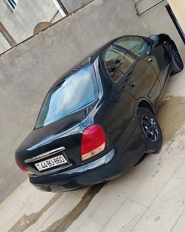 1997 nissan sunny: Nissan Sunny: 1.3 l | 2005 il Sedan — 9