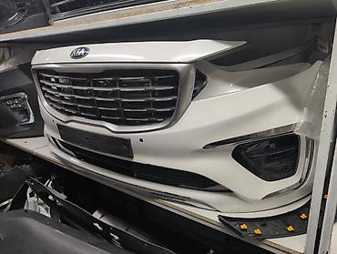 Кузов бөлүктөрү: Kia Carnival В комплекте на фото: - передний бампер белого цвета; - — 2