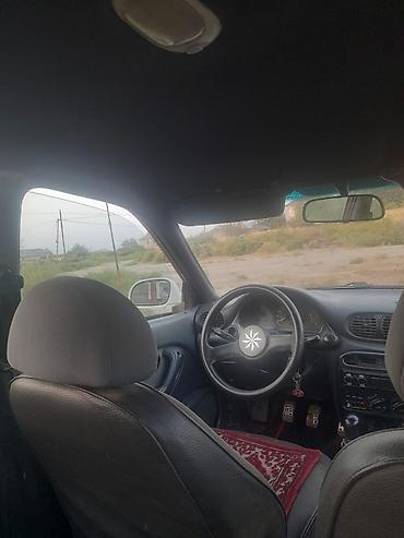 ltz rs bufer: Ağ rəngli sedan avtomobil Xüsusiyyətlər: - Korpus: 4 qapılı sedan — 5