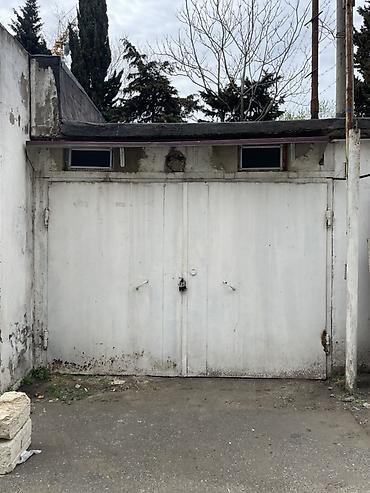 Qaraj darvazaları: Mağaza/qaraj tipli metal qapı - İkiyarpaq, tammetaldan hazırlanmış — 2