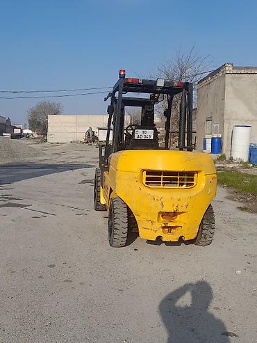 avtocar: Hanga markalı dizel forklift Texniki xüsusiyyətlər: - Yükqaldırma: 3 — 3