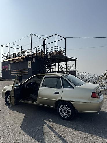 Daewoo Nexia: 2010 г., Механика, Бензин, Седан