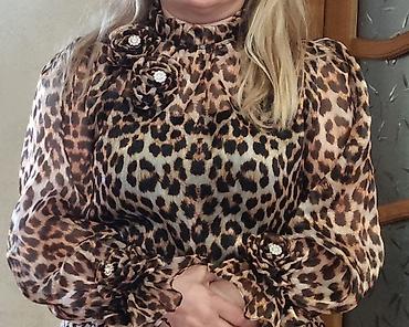 Kişi geyimləri: Qadın üçün leopard naxışlı şifon bluz. Ölcü: 42 100 ₼ alınıb. 1 defe — 1