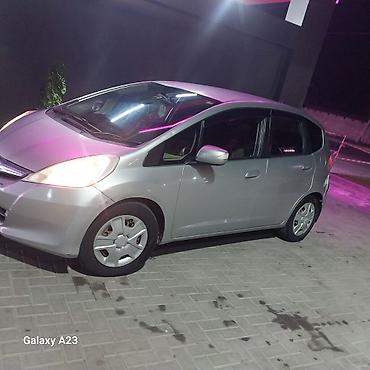 Honda: Honda Fit: 2010 г., 1.3 л, Вариатор, Гибрид, Хэтчбэк — 11