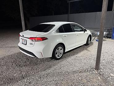хундай аванте 1: Toyota Corolla: 2021 г., 1.8 л, Автомат, Гибрид, Седан — 9