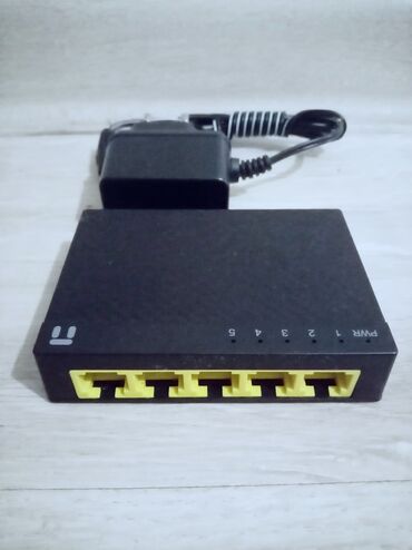 интернет приставки: Коммутатор гигабитный 5 портовый (хаб) Netis ST3105GS, хорошее