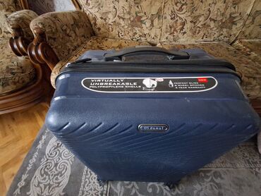 Çamadanlar: TƏZƏ D'S DAMAT brendinə məxsus tünd göy rəngli səyahət çamadanı. Bu — 2