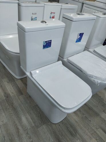 Ağ rəngli unitaz dəsti, hamam otaqları üçün uyğundur. Kompakt dizaynı