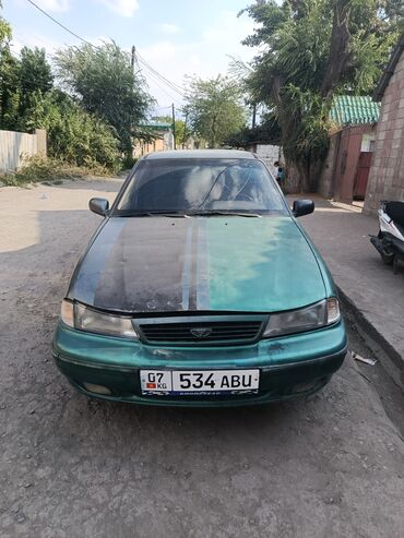 дэу лабо цена в бишкеке: Автомобиль Daewoo Nexia темно-зеленого цвета, седан. Оснащен