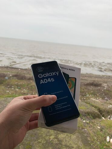 sumqayıt telefon: Samsung Galaxy A04s, 64 GB, rəng - Göy, Zəmanət, Barmaq izi, İki sim kartlı