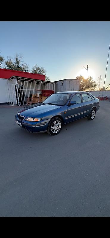 260: Mazda 626: 1997 г., 1.8 л, Механика, Бензин, Хэтчбэк — 1