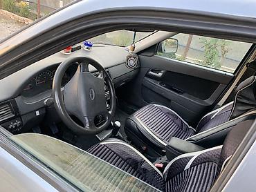 04 sat: VAZ (LADA) Priora: 1.6 l | 2011 il 185000 km Sedan — 5