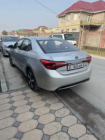 транс: Toyota Corolla: 2020 г., 1.8 л, Вариатор, Гибрид, Седан — 4