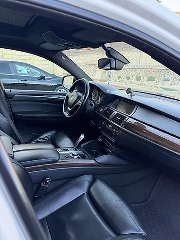 BMW: BMW X6 – ağ kuzov, qara interyer Xüsusiyyətlər: - Krossover-kupe — 2