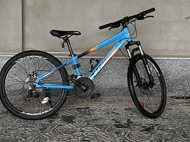 trinx carbon: Горный велосипед TRINX M136 в ярком голубом цвете с оранжевыми — 1
