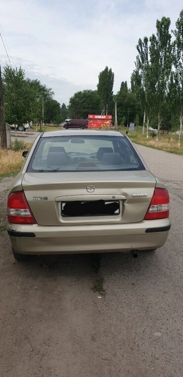 Mazda: Mazda 323: 2000 г., Механика, Бензин, Седан — 2