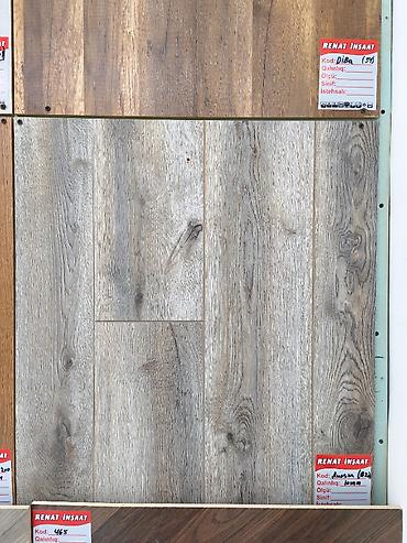 Laminate döşəmə paneli – ağac teksturalı, boz-qəhvəyi tonlarda - at lalafo.az Laminate döşəmə paneli – ağac teksturalı, boz-qəhvəyi tonlarda -