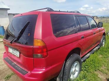 Унаа: Mitsubishi Montero Sport: 1997 г., 2.4 л, Кол менен иштөөчү, Бензин, Жол тандабас — 5