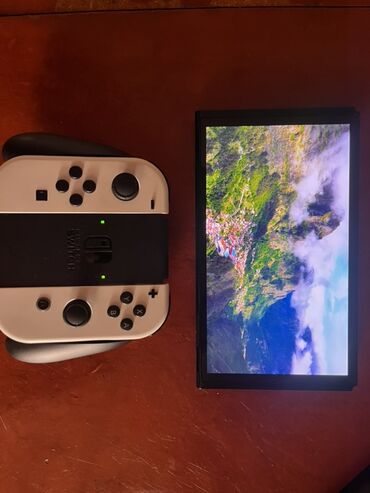 Nintendo Switch: Nintendo Switch OLED (ağ Joy‑Con) oyun konsolu Xüsusiyyətlər: - 7 — 8