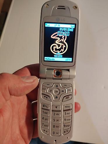 plafonska ventilacija: LG preklopni mobilni telefon (crveno‑srebrni), sa spoljnim ekranom i — 9
