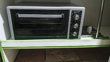 yemek bisiren aparat: Ellay mini elektrik sobası. Şüşə qapılı kompakt sobadır, ön — 1