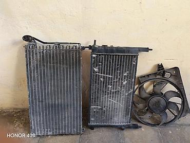 sprinter ehtiyat hisseleri: Avtomobil üçün soyutma sistemi hissələri satılır. Şəkillərdə radiator — 1