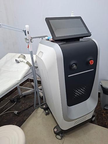 epilator aparati: Estetik prosedurlar üçün nəzərdə tutulmuş lazer epilyasiya aparatı. Bu — 2