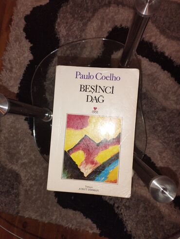 dini kitablar satisi: Paulo Coelho "Beşinci Dağ" Qeyd: Yalnız 20 Yanvar, 28 May, Sahil