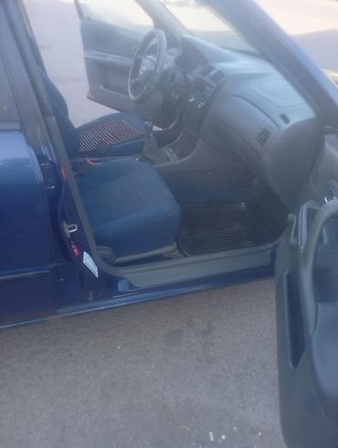 222 кузов: Mazda Familia: 2000 г., 1.5 л, Механика, Бензин, Седан — 8