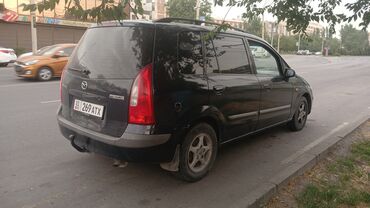машина жалалабат: Черный минивэн Mazda Premacy, универсальное транспортное средство с