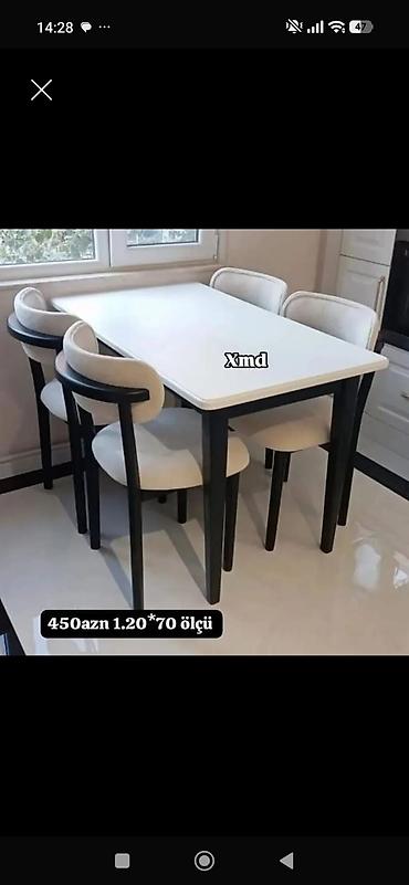 Ağ üstlü, qara ayaqlı yemək masası və 4 ədəd yumşaq oturacaqlı stul