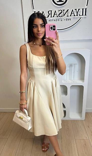 Haljine: 💫Ženska midi haljina sa mašnom na leđima
2700
Uni velicina — 8