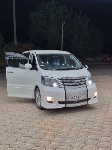 сиденье альфард: Белый минивэн Toyota Alphard, представленный в светлом оттенке