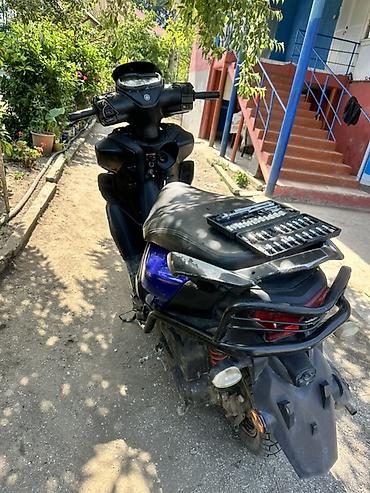Mopedlər,skuterlər: Yamaha skuter Mühərrik: benzin, avtomatik variator Kuzov: şəhər tipi — 4