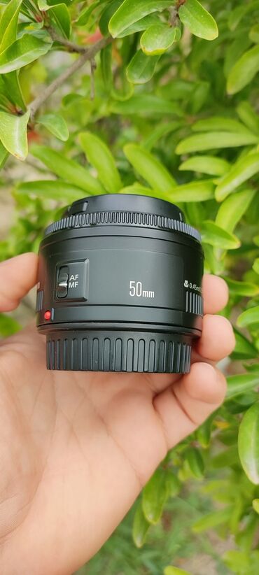 Canon 50 mm lens 1:1.8|| (0.45m/1.5 ft). Yenidən seçilmir demək olar