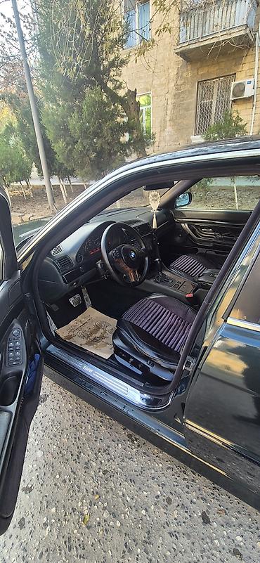 bmw e38: BMW 7 Series E38 sedan - Kuzov: qara rəng, klassik E38 dizaynı, ön və — 2
