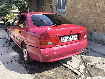 jac js6: Mitsubishi Carisma: 1998 г., Механика, Бензин, Седан — 4