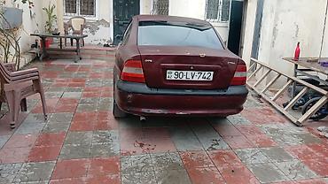 purjun satisi: Opel Vectra: 1.8 l | 1996 il 266842 km Sedan — 10