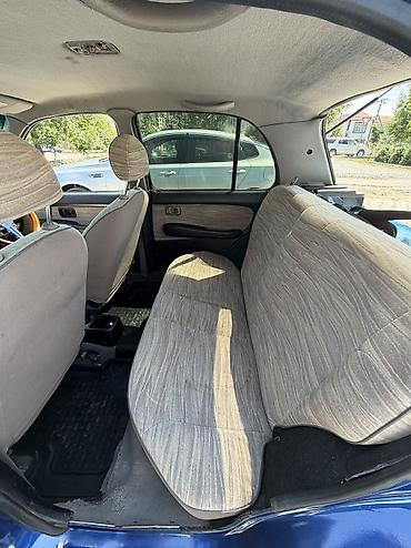 Транспорт: Nissan March: 2000 г., 1 л, Автомат, Бензин, Хэтчбэк — 7