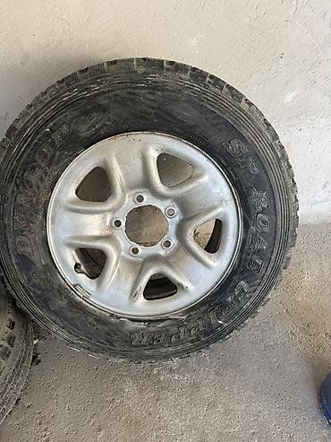 Колесо 1 шт: стальной диск с внедорожной шиной Dunlop Grandtrek