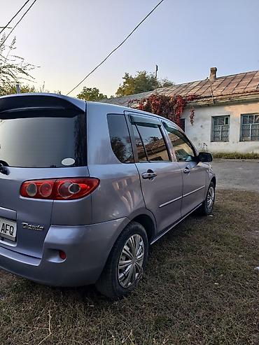 рестайл: Mazda Demio: 2005 г., 1.3 л, Автомат, Бензин, Хэтчбэк — 7