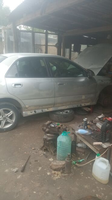 корея машина цена: Mitsubishi Carisma: 1996 г., Механика