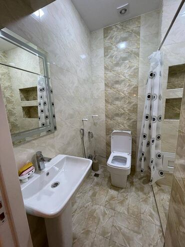 Uzunmüddətli kirayə mənzillər: Elit ticarət mərkəzi Yuxa Restoranının arxasında 16 mərtəbəli binanın — 9